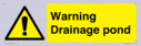 warning-drainage-pond~